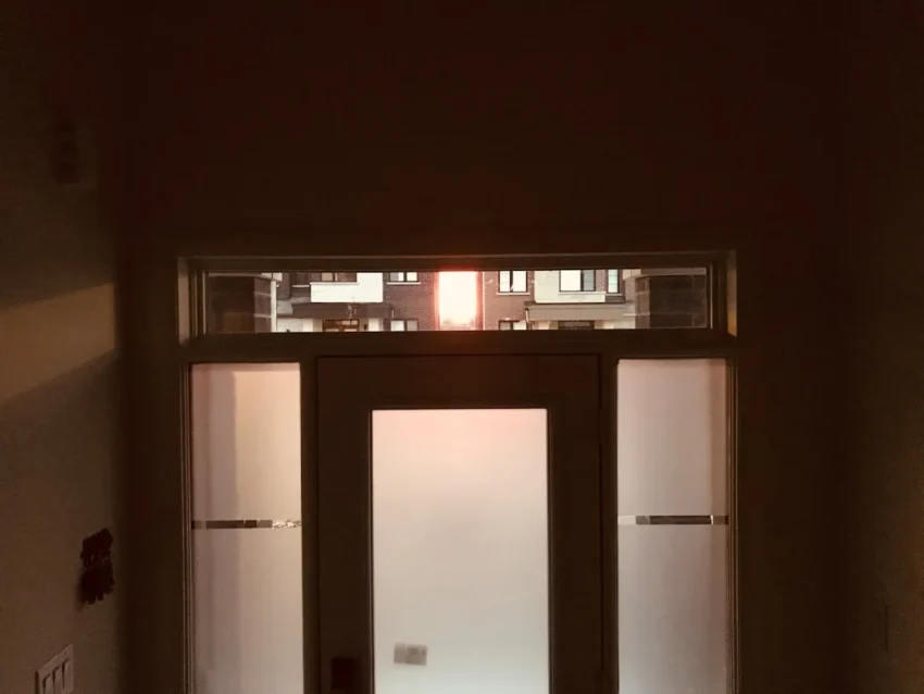 Open door with sunrise light symbolizing the journey to unlock your potential