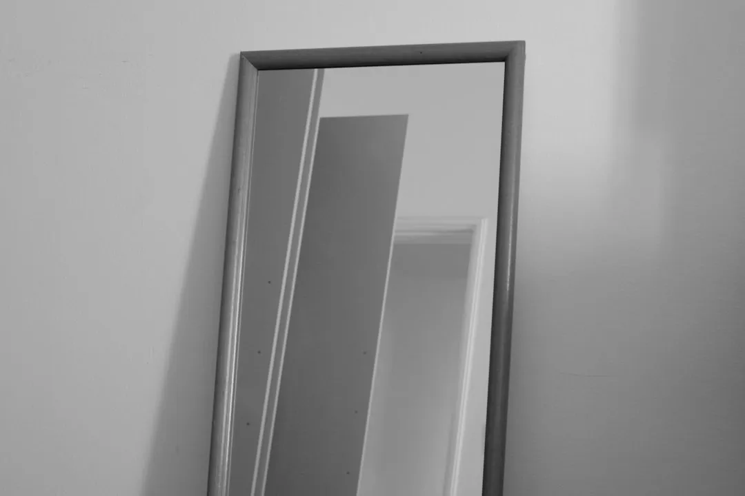 Person reflecting in mirror practicing mindset responsibility